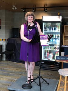 Angela Crocker at the podium during the book launch for Declutter Your Data